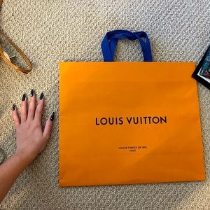 Medium sized Louis Vuitton shopping bag